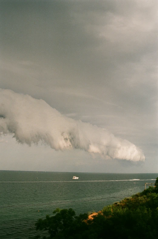 the water with a boat that has just passed in the water