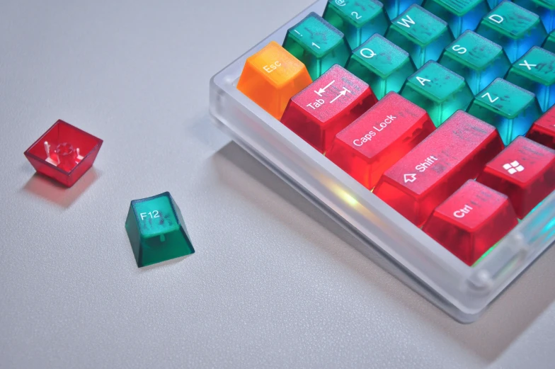 an orange and green colored keyboard, with red and green keys