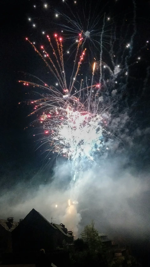 a large firework display in the night sky