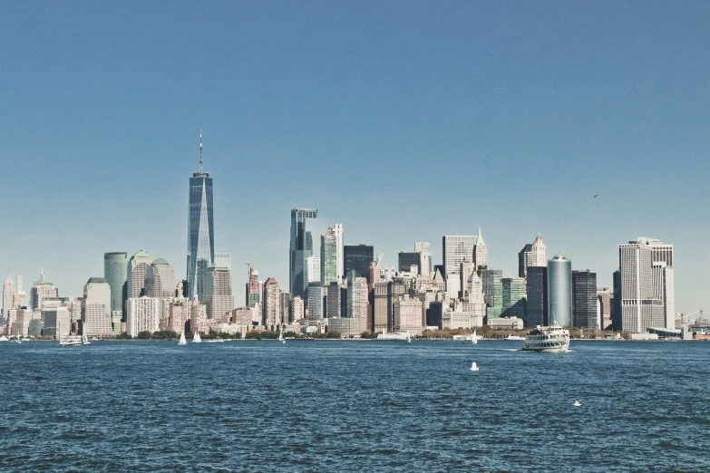 the city skyline as seen from across the water