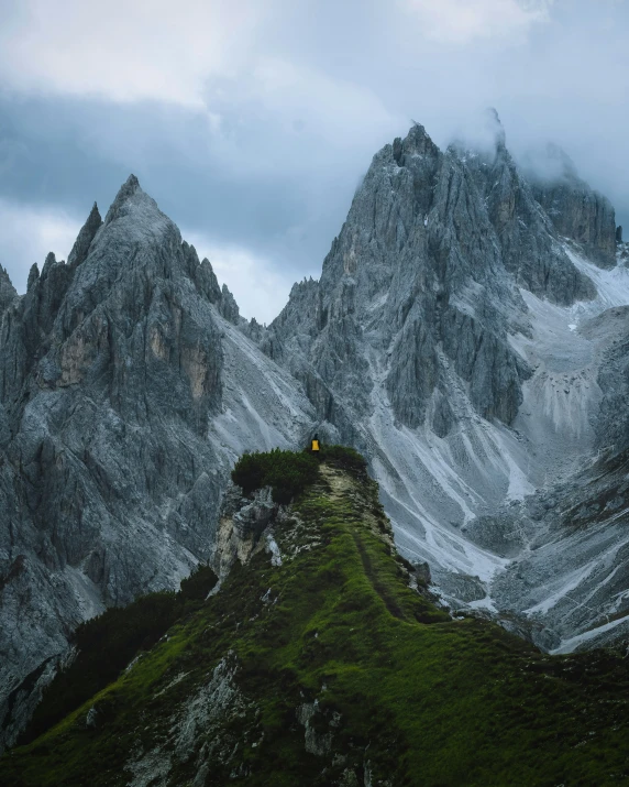 a small castle in the middle of a mountain