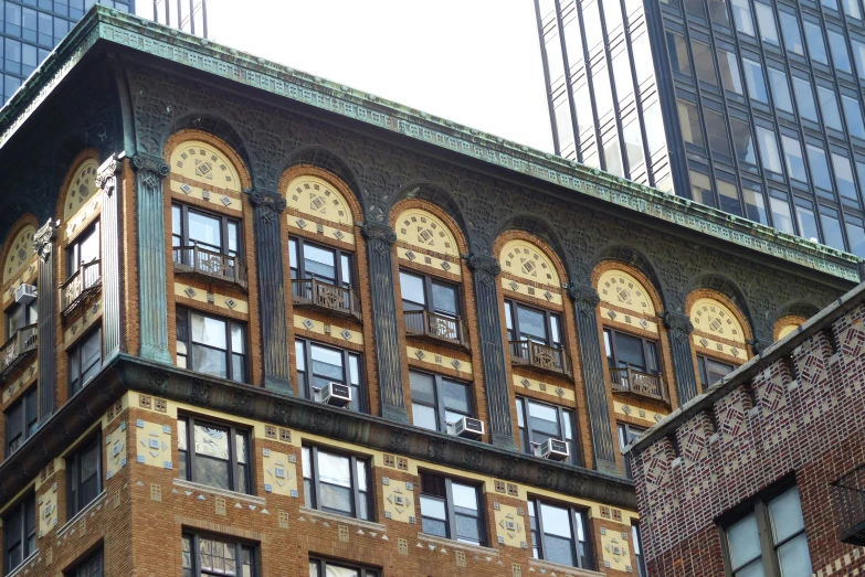 a close up of a building near other buildings