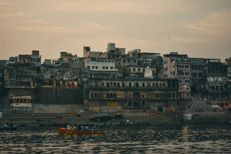 an image of some buildings over water