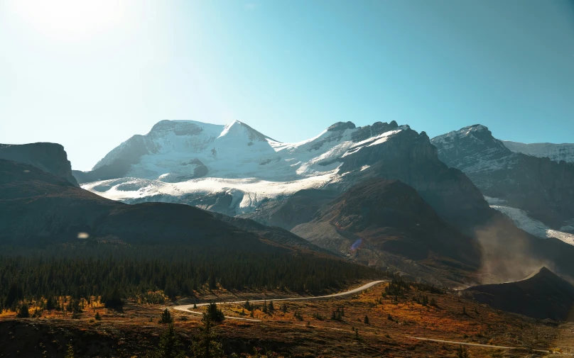 the view of the mountain peaks covered in snow