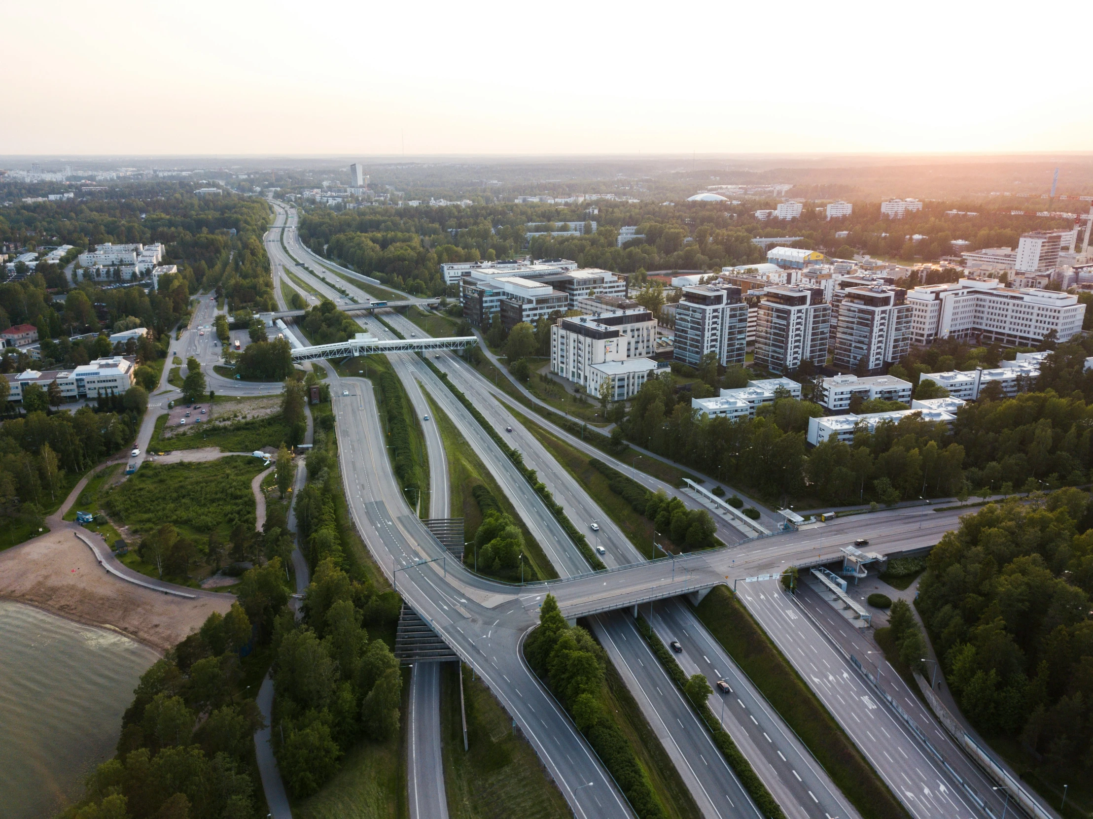 an aerial view of interstate in urban area