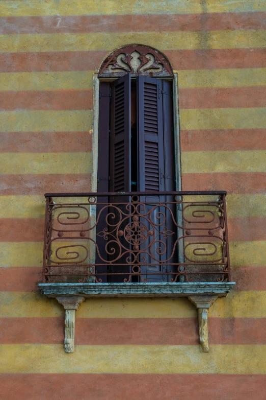 the balcony of the building has balconies on it