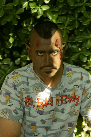 a man with fake eye lashes and eyebrows on his face, in a shirt