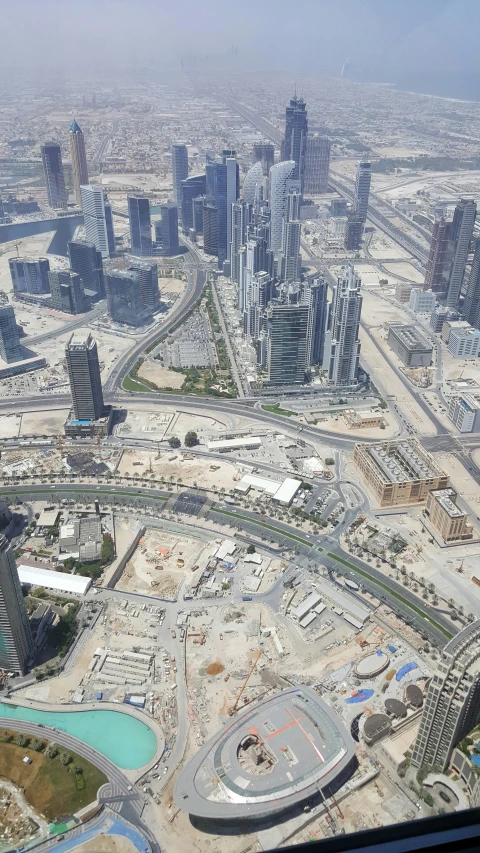 the view of a large city from the window of an airplane