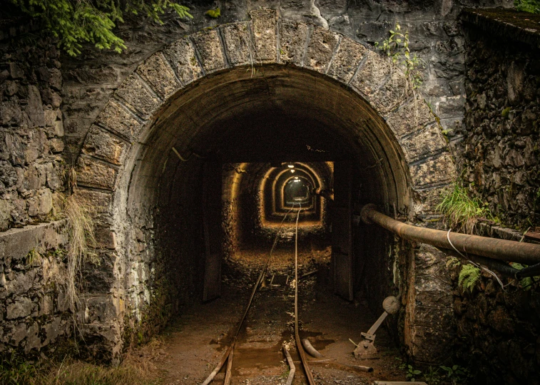 a train tunnel is shown through a tunnel