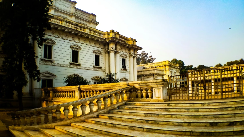 a group of stone stairs in front of a building