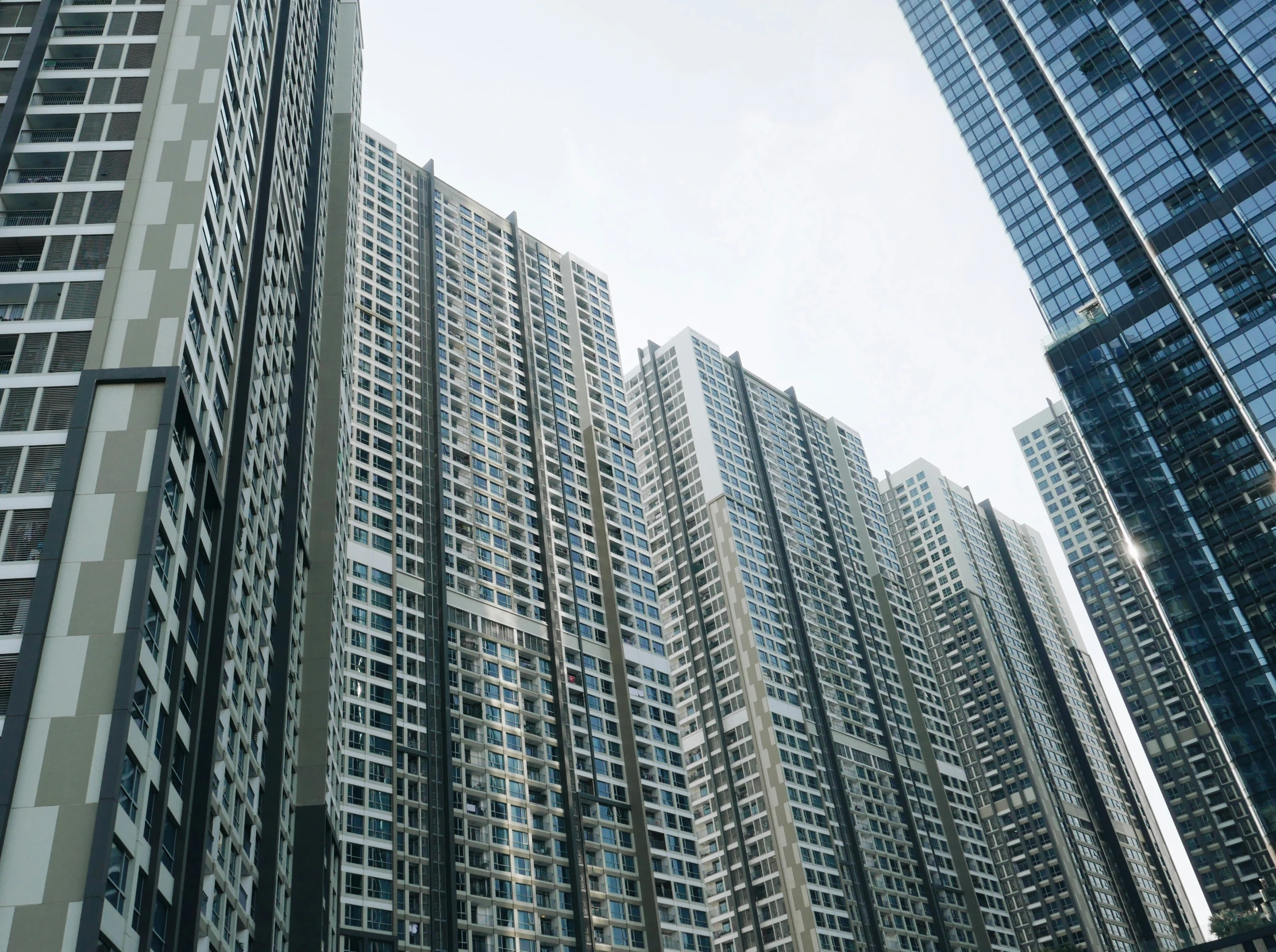 a street light next to some tall buildings