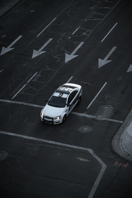 a car on the side of a city street