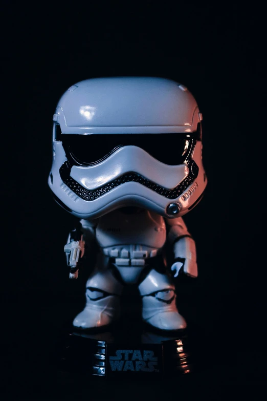 a white bobble head has been changed to be stormtroot