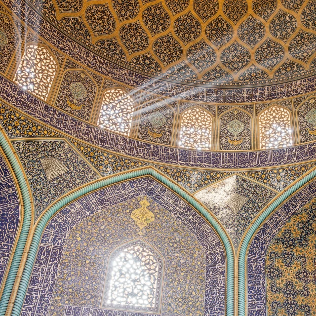 the walls of this large building are decorated with intricate designs