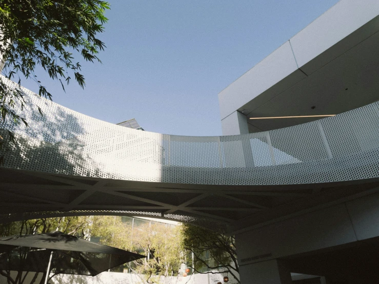 a walkway over a large concrete building