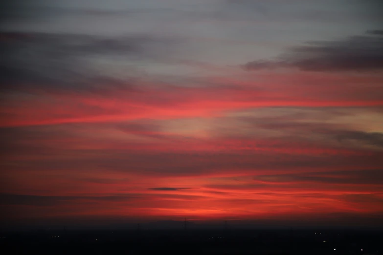 the red sky has some sort of unusual cloud formation