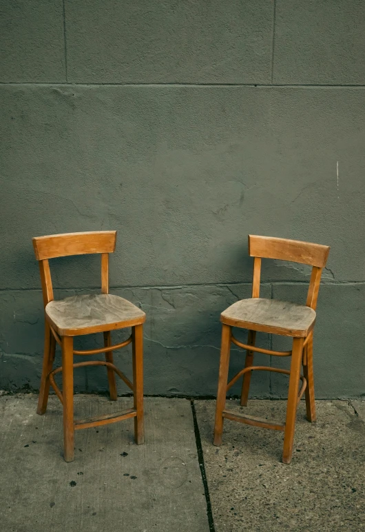 two chairs are sitting next to each other