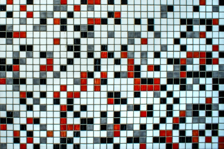 some kind of multicolored tile with red and grey squares