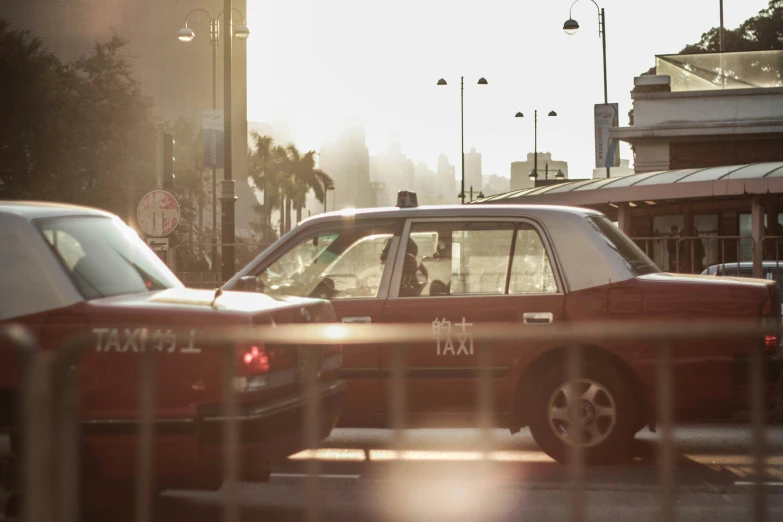 a couple of vehicles that are on the street