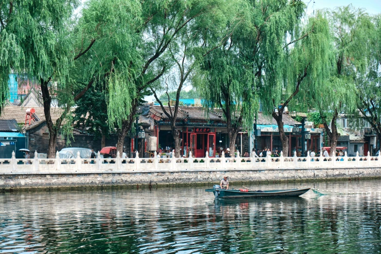 a boat floating on top of a body of water