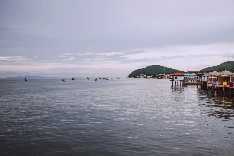 a harbor filled with lots of boats on top of water