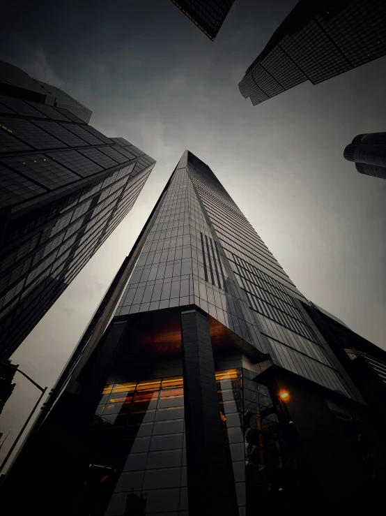 the sky is visible over two large buildings