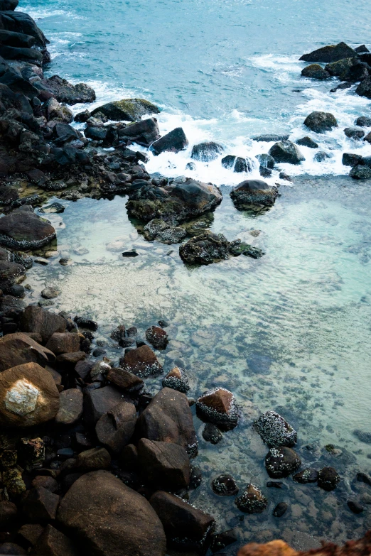 the water is crystal clear from high above a beach