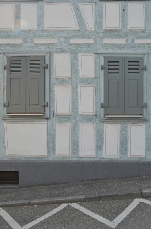 a clock sitting in the corner of a building