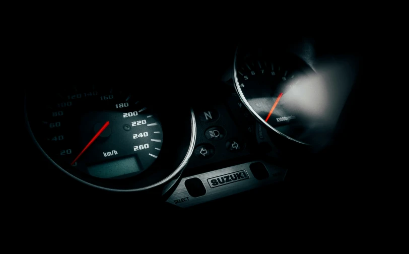 car dashboard with the meter and dash lights on