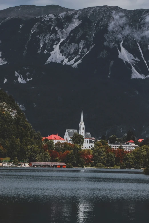 a small town on the side of a mountain range