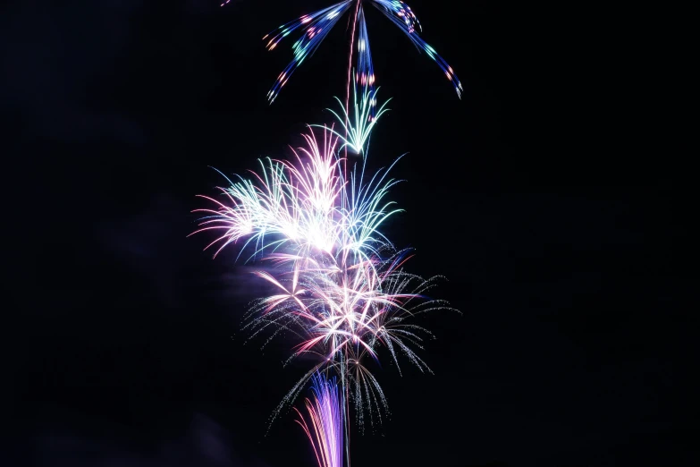 a bunch of firework is shown during the night sky