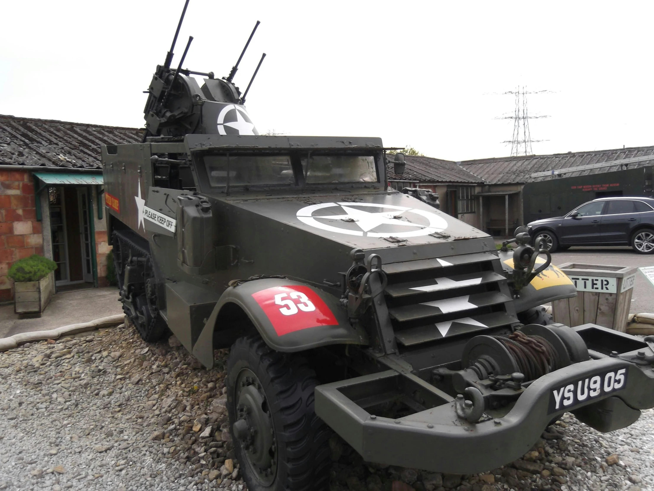 a military truck on the side of a road