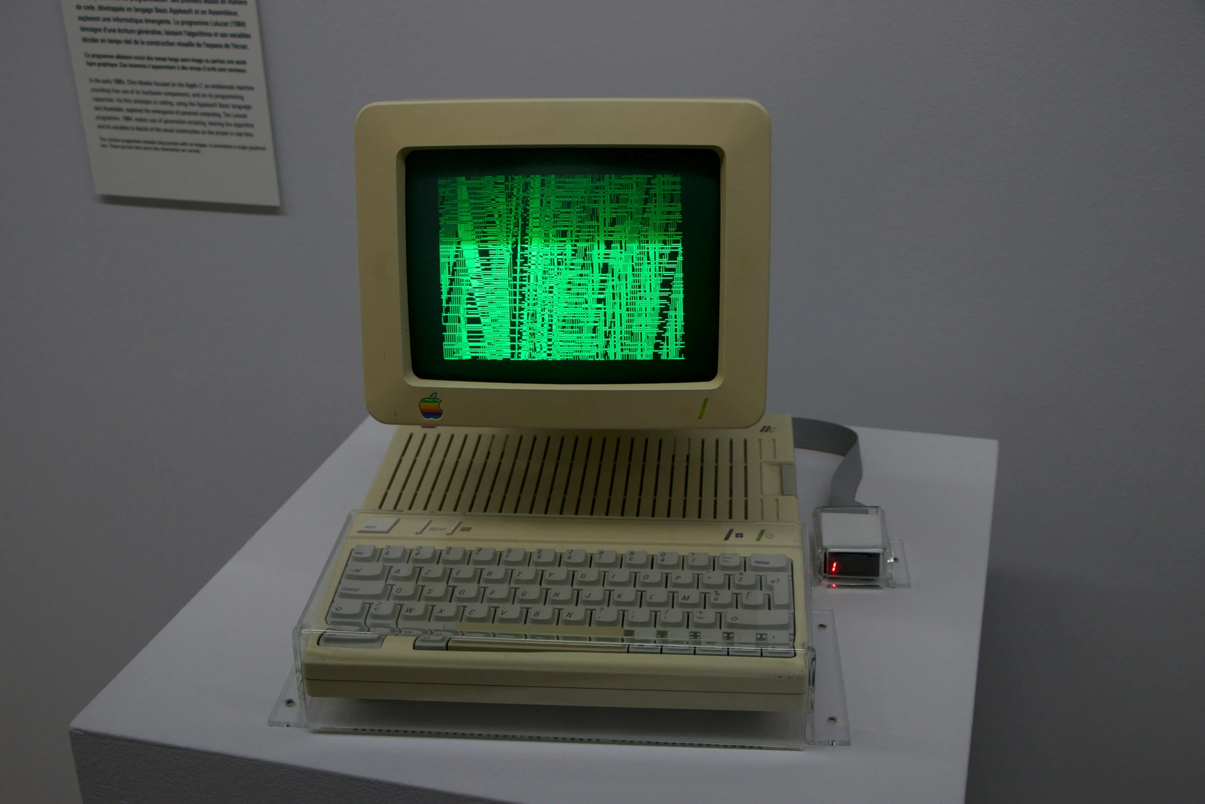 an old computer sitting on top of a table