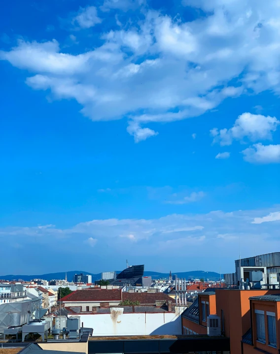 an air plane flying over a city