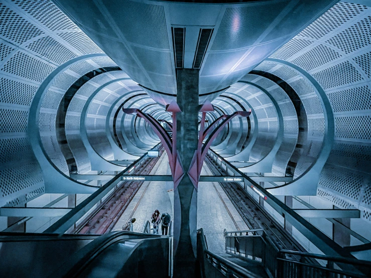 there is an underground subway that has many stairs and platforms