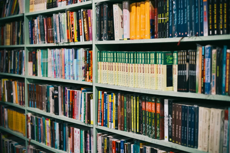 a large book shelf filled with lots of books