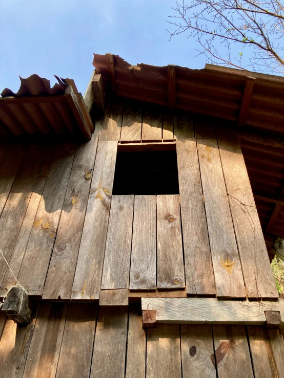 a po of a wooden wall that looks like a house