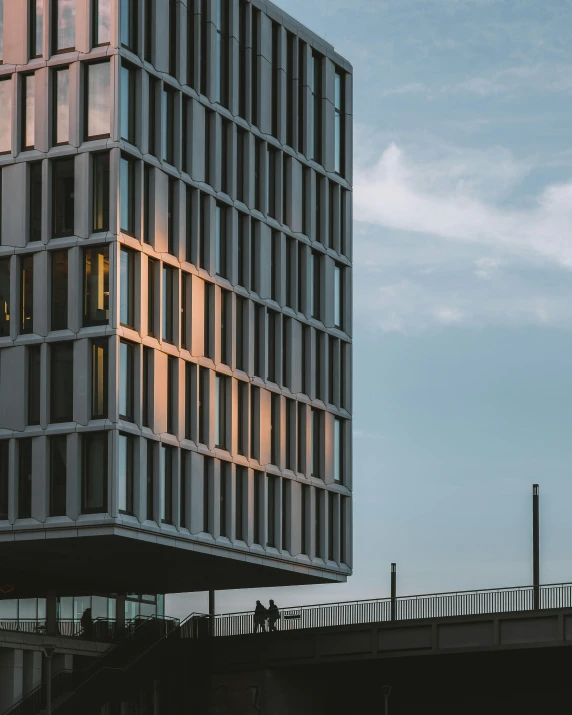 people walking in the background of a bridge