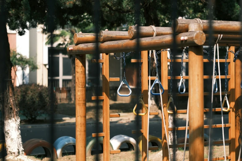 a playground set with several different objects and chains
