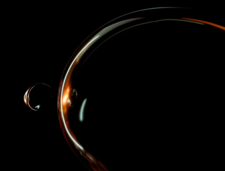 a glass ball in the dark on a table