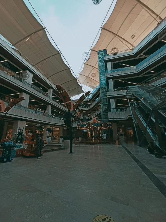 a group of luggage is in an empty store