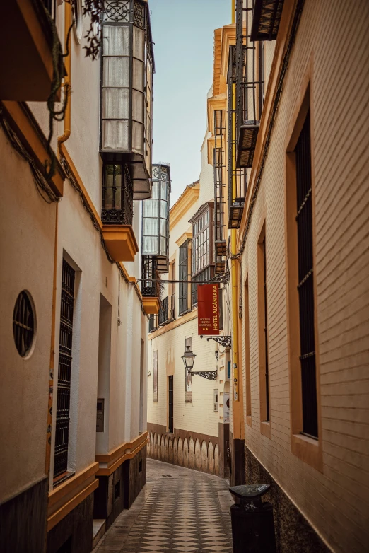 a street with several different buildings and windows