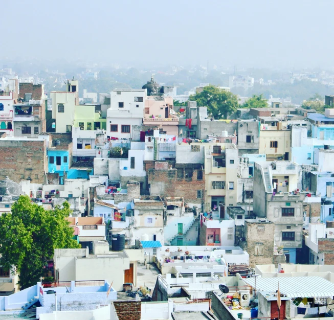 a city with many homes and buildings in the background