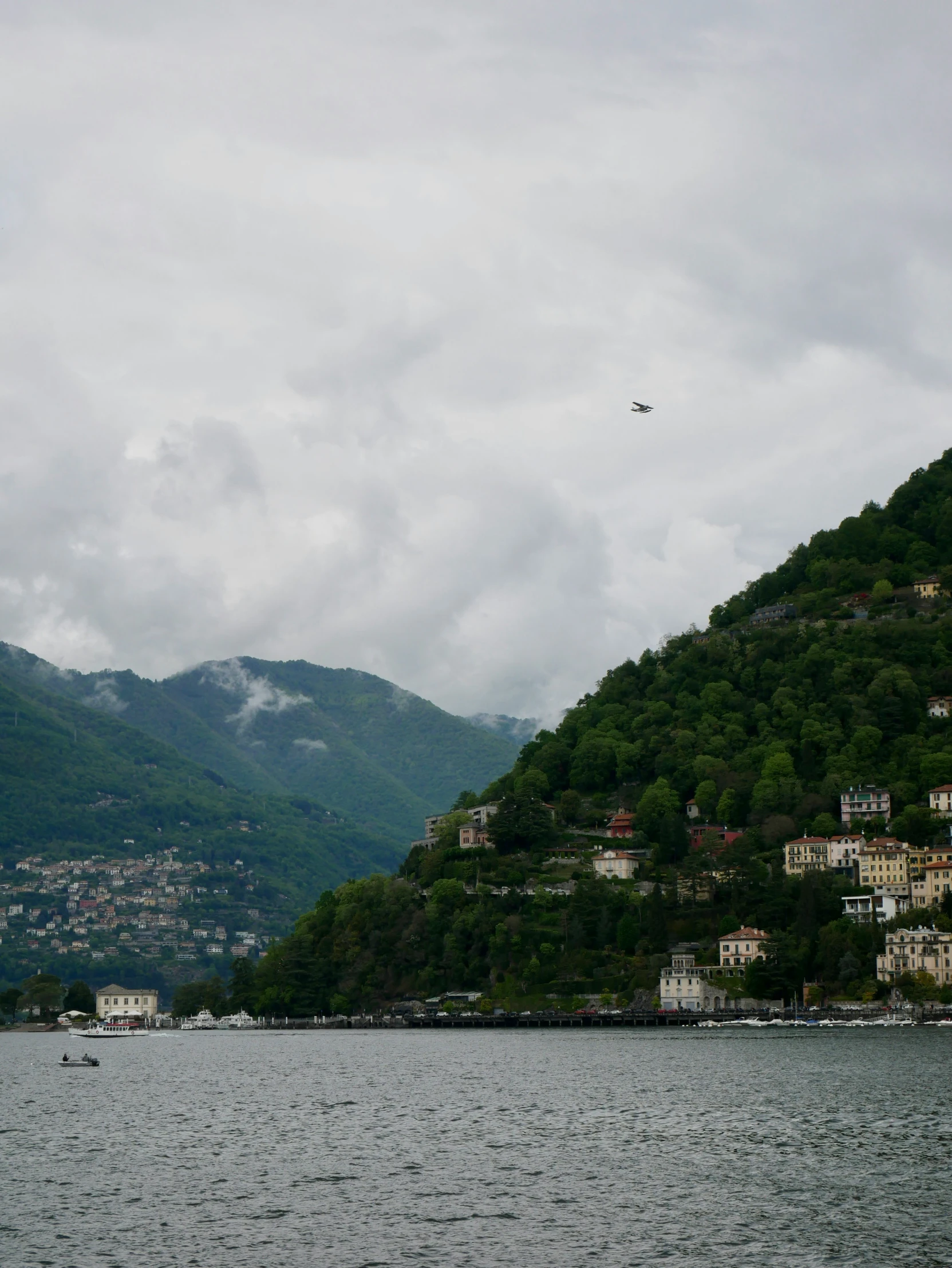 a small boat is floating on the water