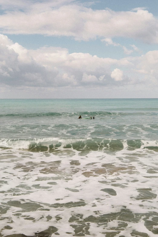 a po taken on the ocean with waves crashing in