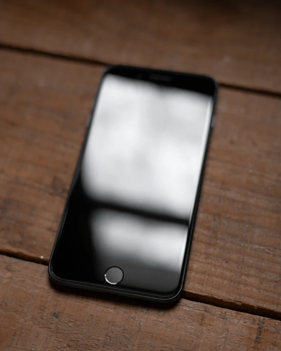 a close up view of an iphone on a table