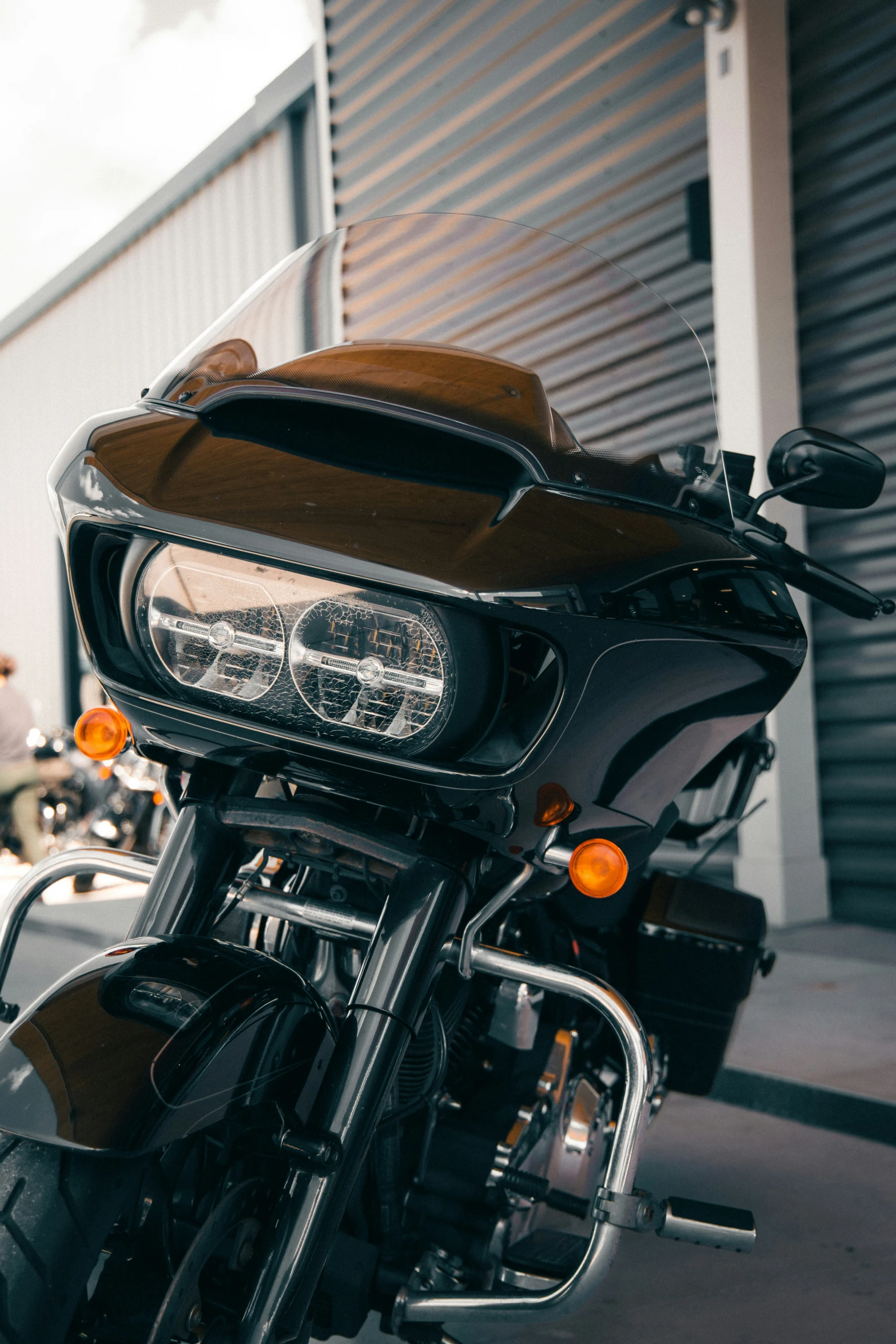 an image of a motorcycle parked on the sidewalk