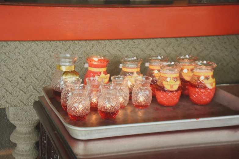 different types of alcohol sitting on a tray