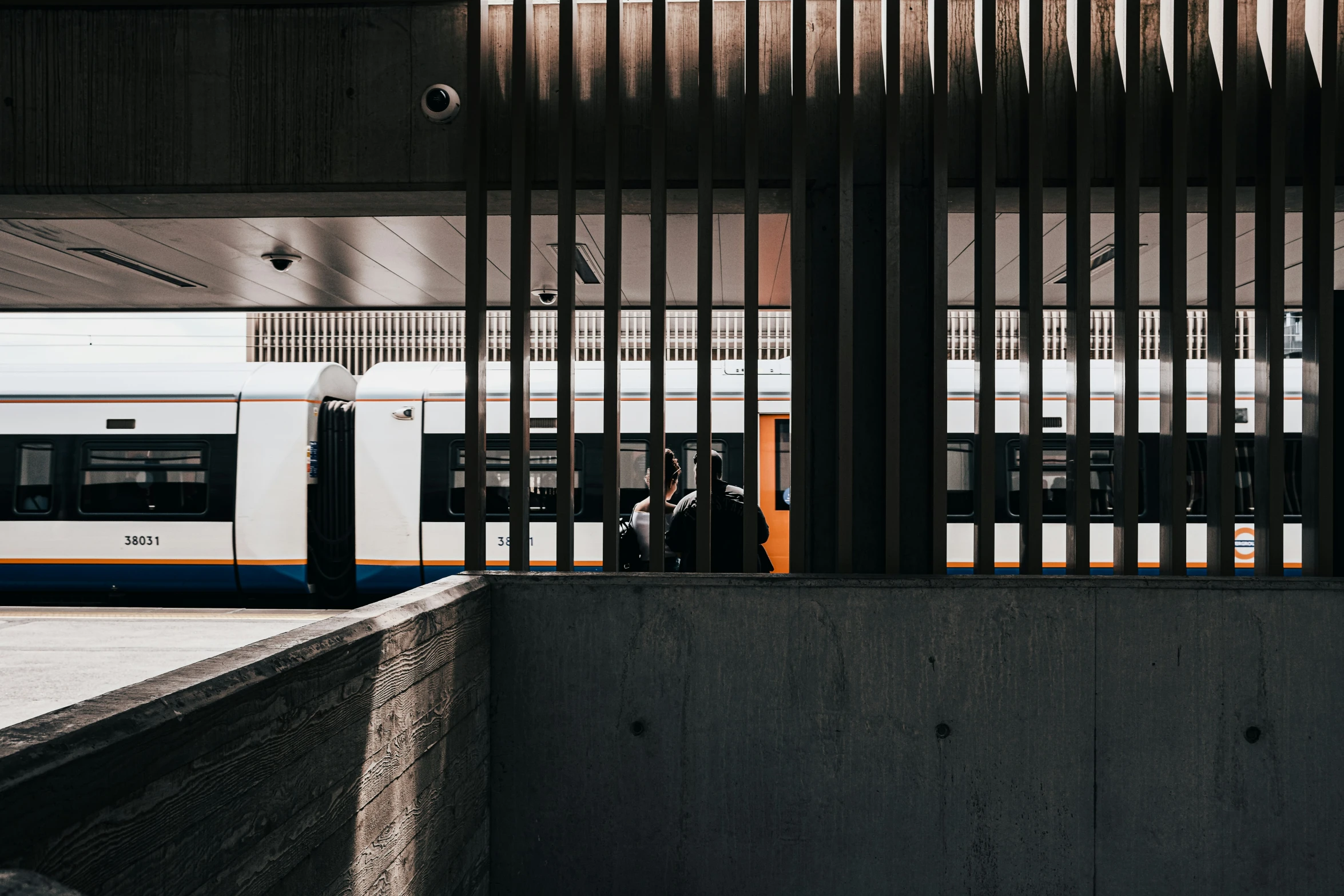 a train going by in a subway station