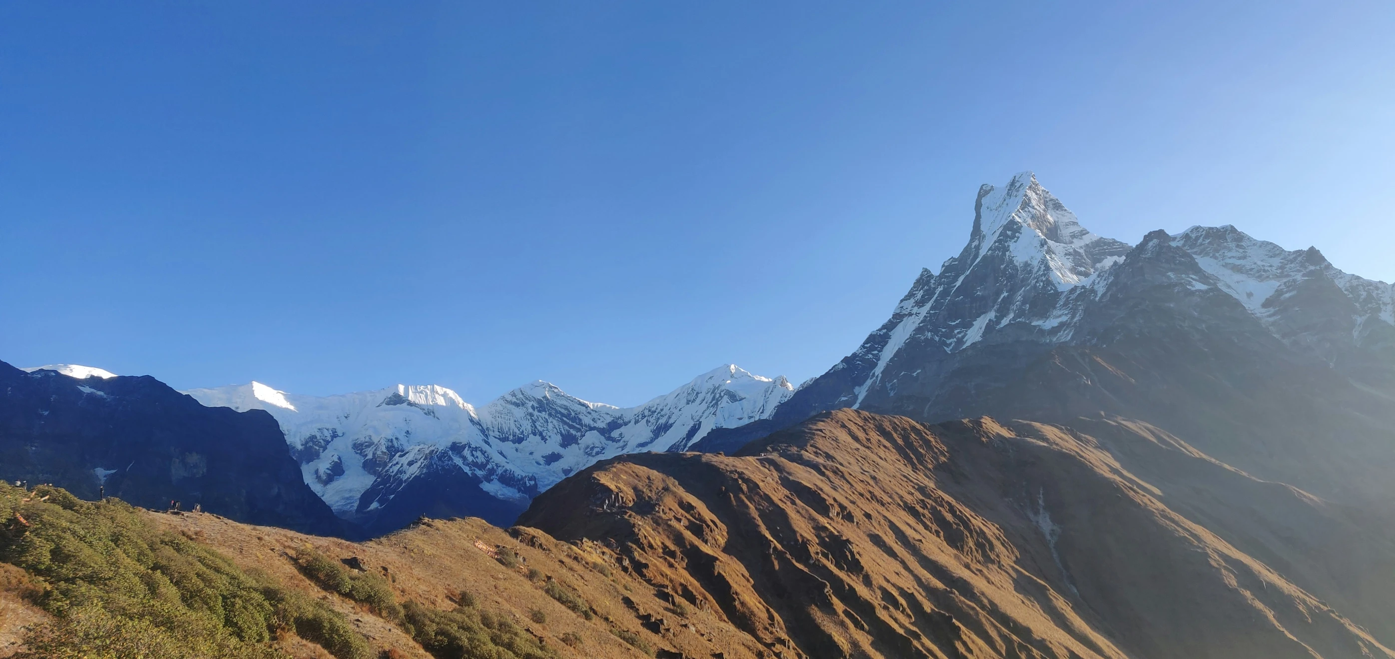 an image of snow - covered mountain tops in the mountains